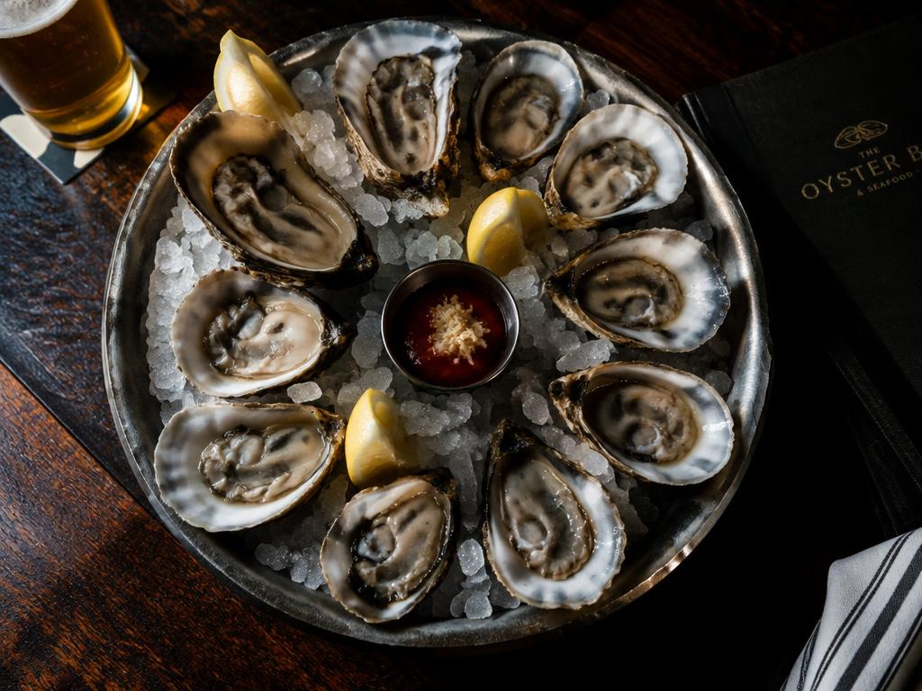 Fresh oysters on ice at the bar